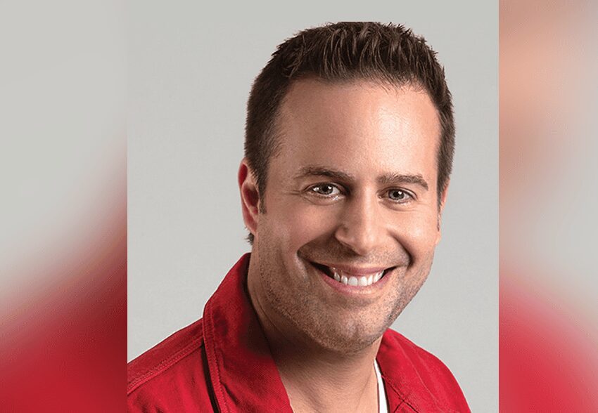 Portrait of smiling man wearing red jacket